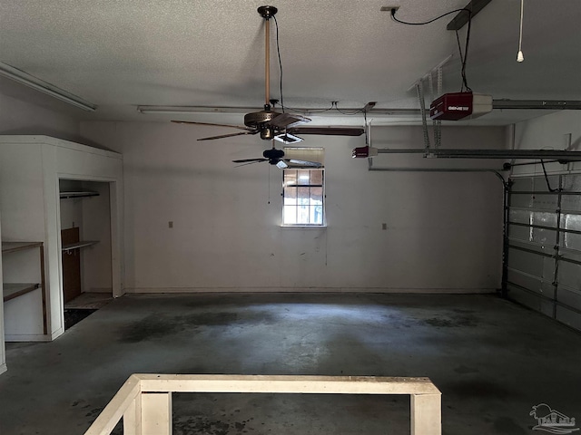 garage featuring a garage door opener and ceiling fan
