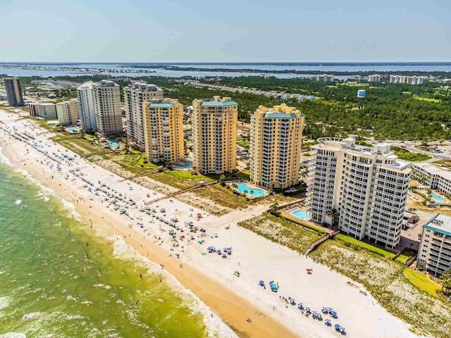 aerial view with a view of the beach and a water view