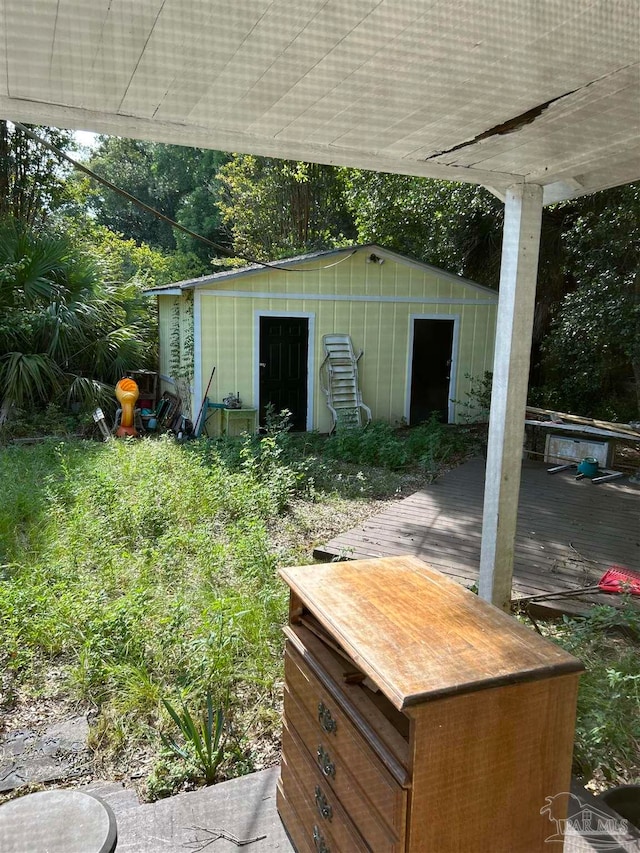 view of yard with a wooden deck