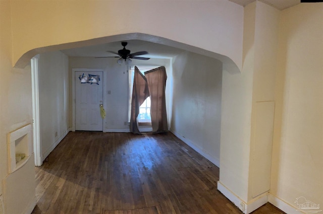 entryway with ceiling fan and dark hardwood / wood-style floors