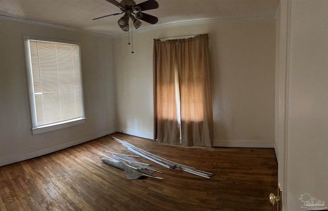 spare room with ornamental molding, ceiling fan, and hardwood / wood-style flooring