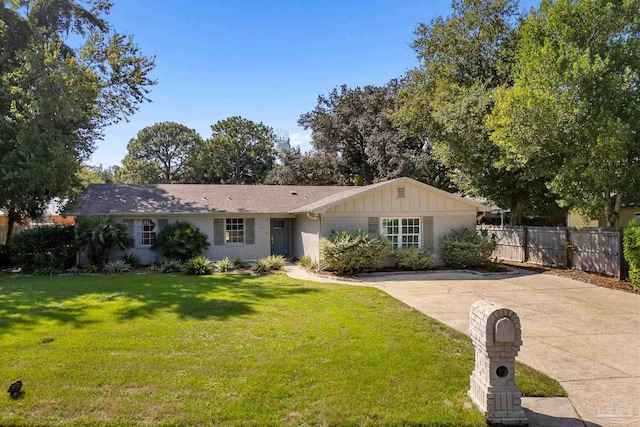 ranch-style house with a front yard