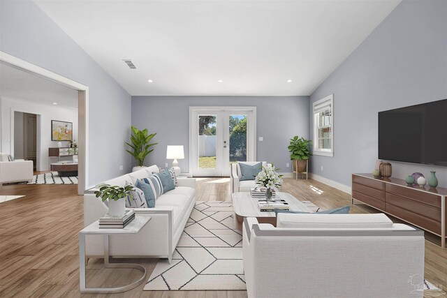 103 Florida Ave, Gulf Breeze, FL 32561 - living area featuring recessed lighting, visible vents, french doors, baseboards, and light wood-style flooring