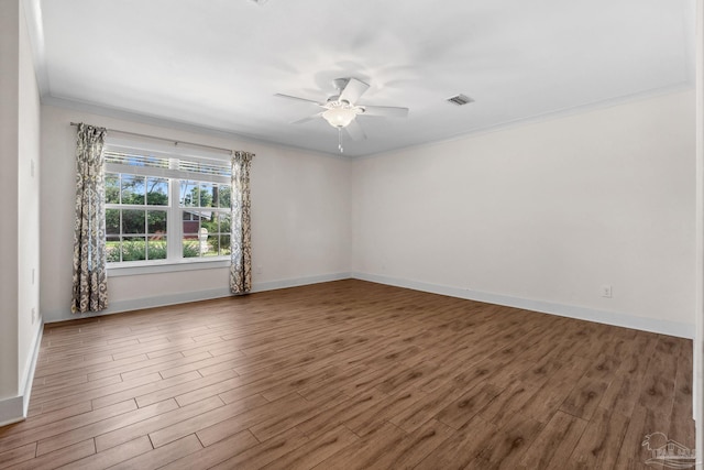 unfurnished room featuring ornamental molding, hardwood / wood-style floors, and ceiling fan