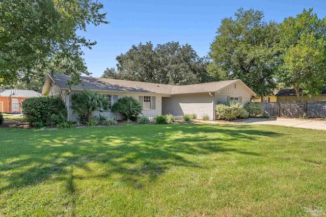 ranch-style house with a front yard