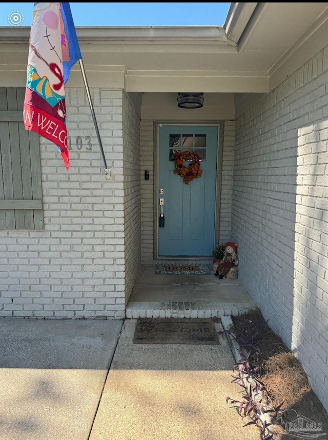 103 Florida Ave, Gulf Breeze, FL 32561 - view of exterior entry with brick siding