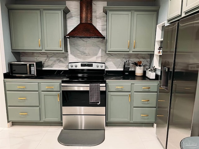 kitchen with green cabinets, custom exhaust hood, decorative backsplash, light tile patterned floors, and stainless steel appliances