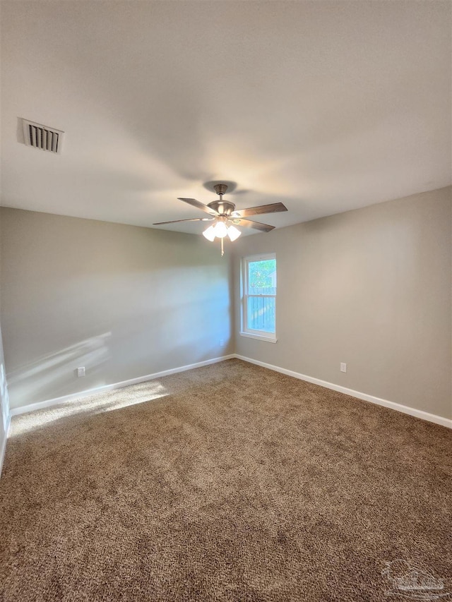 empty room featuring carpet and ceiling fan