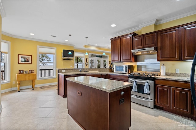 kitchen featuring decorative light fixtures, stainless steel appliances, ornamental molding, kitchen peninsula, and light stone counters