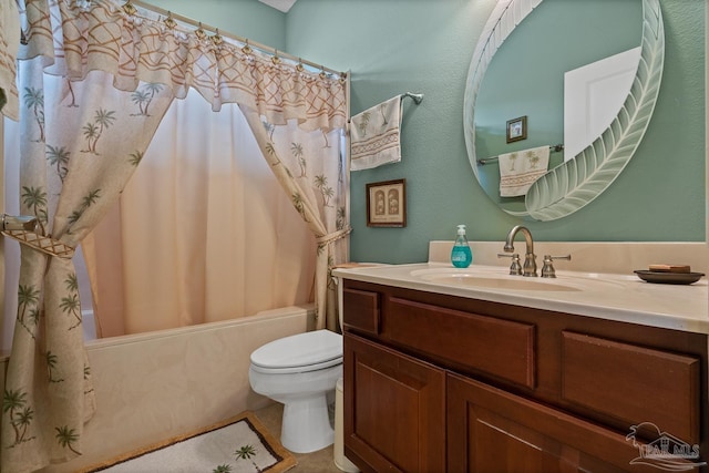 full bathroom featuring toilet, vanity, and shower / bath combo with shower curtain