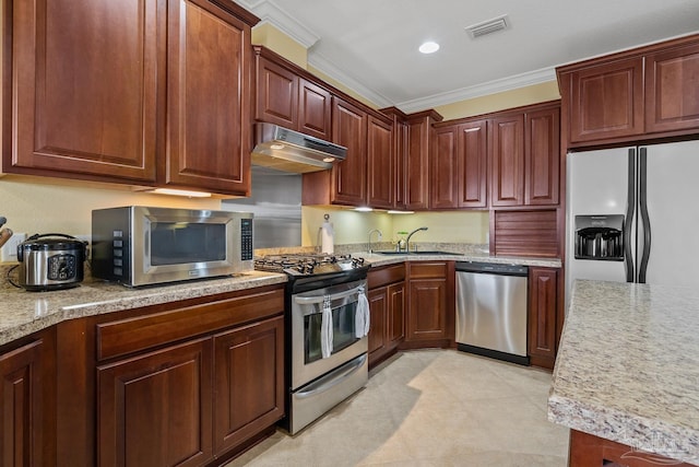 kitchen featuring appliances with stainless steel finishes, ornamental molding, and sink