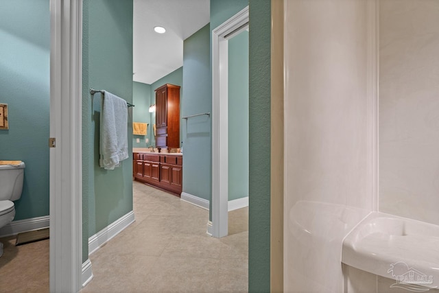 bathroom with sink and toilet