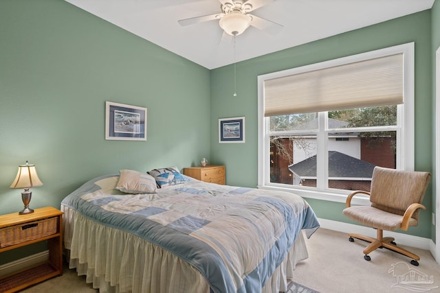 bedroom with ceiling fan and carpet