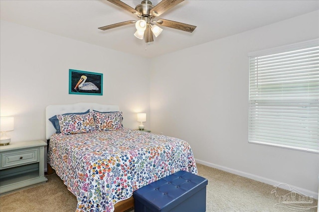 5451 Peach Dr, Pace, FL 32571 - carpeted bedroom with baseboards and a ceiling fan