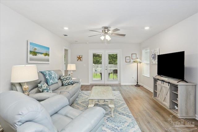 5451 Peach Dr, Pace, FL 32571 - living area with ceiling fan, french doors, light wood-style floors, and recessed lighting