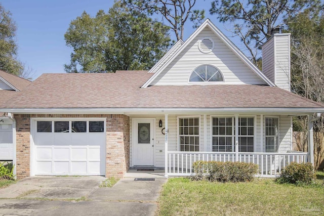 view of front of property with a porch, a chimney, a shingled roof, a garage, and brick siding