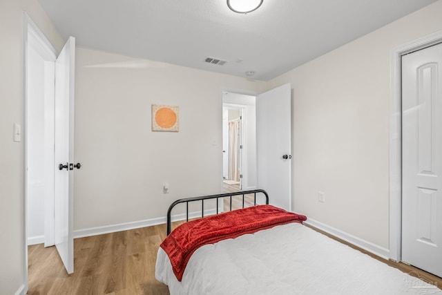 bedroom featuring light hardwood / wood-style floors