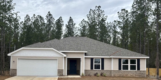 single story home with a garage