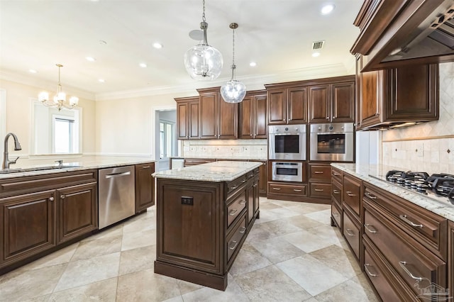 3995 W Madura Rd, Gulf Breeze, FL 32563 - kitchen featuring visible vents, tasteful backsplash, custom range hood, a sink, and appliances with stainless steel finishes