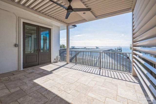 3995 W Madura Rd, Gulf Breeze, FL 32563 - balcony featuring a ceiling fan and french doors