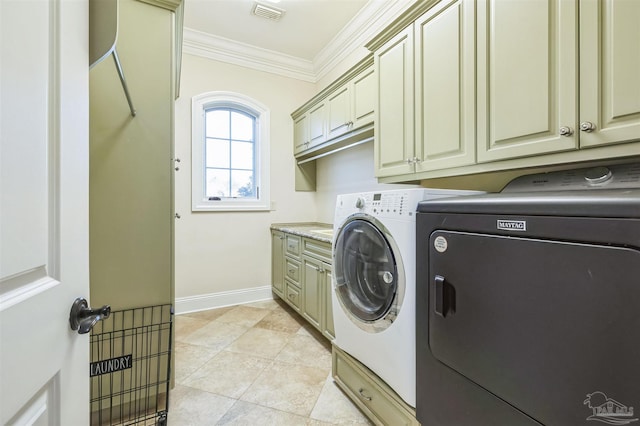 3995 W Madura Rd, Gulf Breeze, FL 32563 - clothes washing area with crown molding, visible vents, washer and dryer, baseboards, and cabinet space