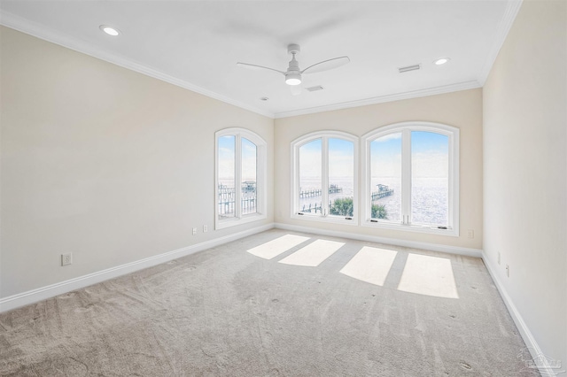 3995 W Madura Rd, Gulf Breeze, FL 32563 - empty room featuring crown molding, carpet floors, baseboards, and visible vents
