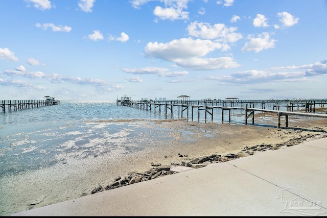 3995 W Madura Rd, Gulf Breeze, FL 32563 - dock area featuring a water view, a beach view, and a pier