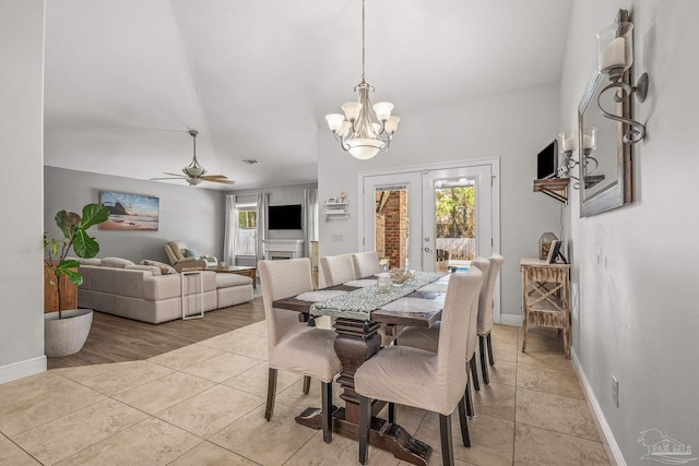 dining room featuring french doors, light tile patterned flooring, and plenty of natural light