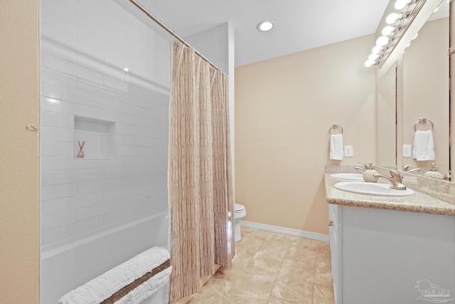 full bathroom with tile patterned floors, vanity, toilet, and shower / tub combo with curtain