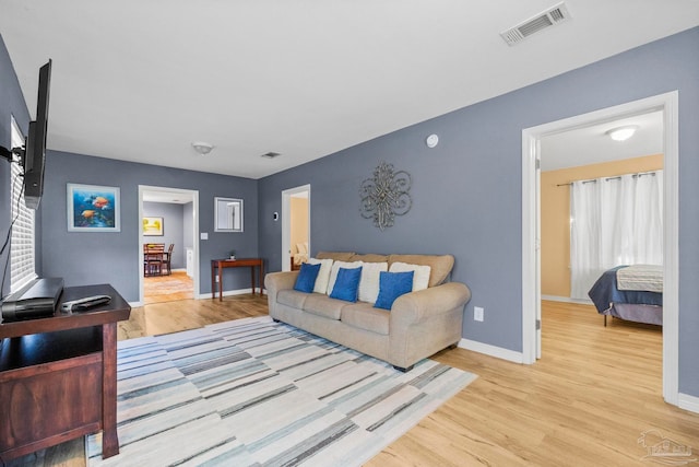 living room with light wood-type flooring