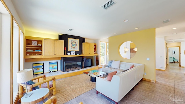 living room featuring light tile patterned flooring