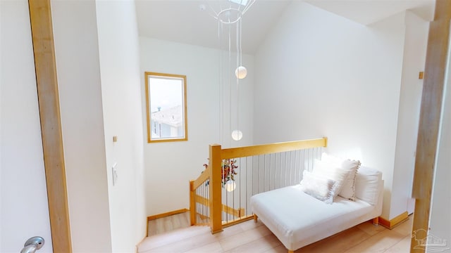 bedroom featuring light tile patterned flooring and an inviting chandelier