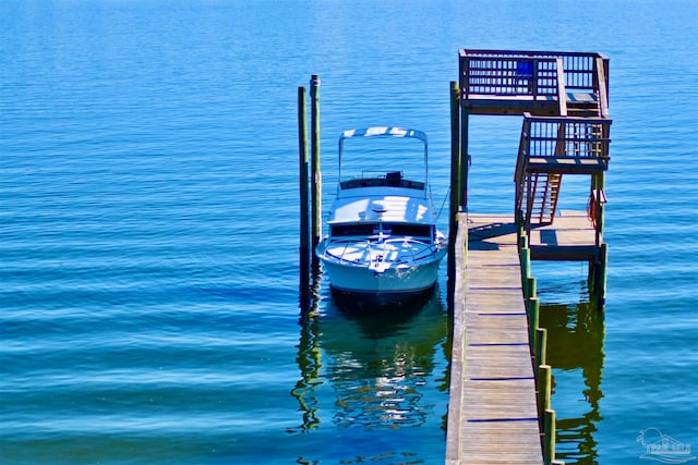 dock area featuring a water view