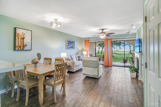 dining space with ceiling fan