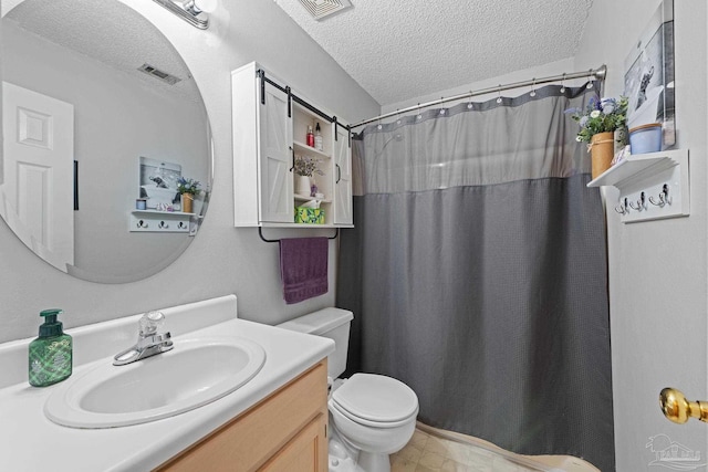 bathroom with vanity, toilet, a textured ceiling, and a shower with shower curtain