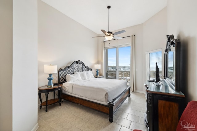 bedroom featuring ceiling fan, vaulted ceiling, and access to outside