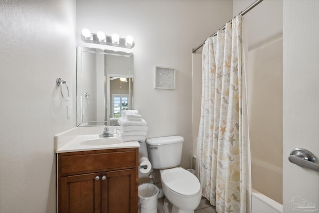 full bathroom featuring vanity, shower / tub combo with curtain, and toilet