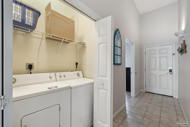 laundry area with light tile patterned flooring and independent washer and dryer