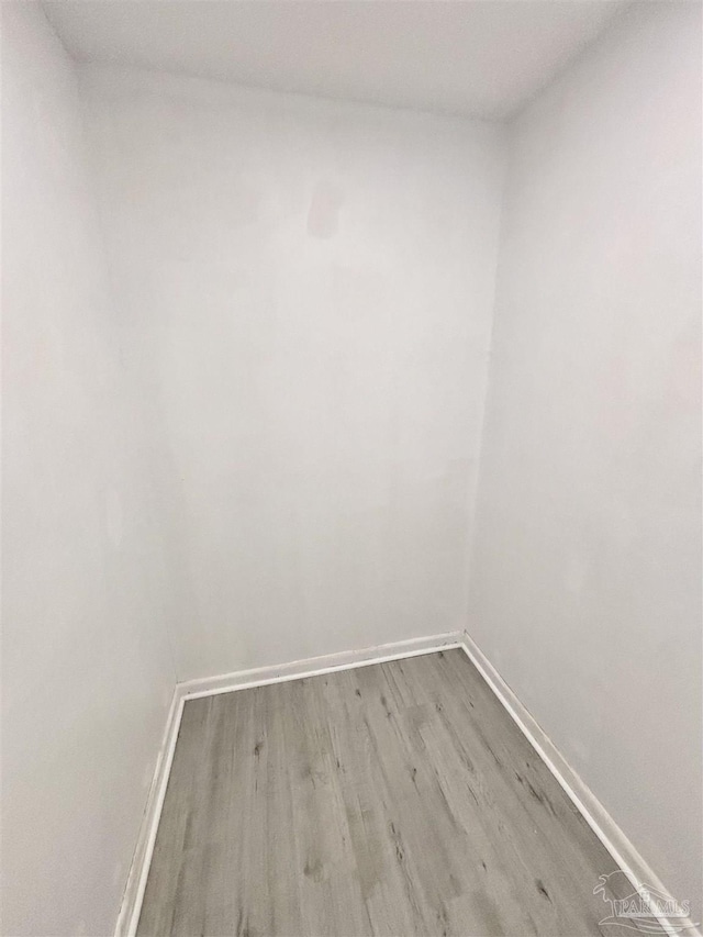 5737 Chumuckla Hwy, Pace, FL 32571 - empty room with wood finished floors and baseboards