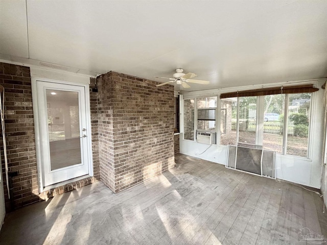 5737 Chumuckla Hwy, Pace, FL 32571 - unfurnished sunroom featuring a ceiling fan