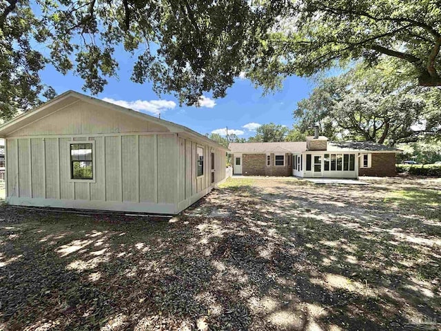 5737 Chumuckla Hwy, Pace, FL 32571 - back of property featuring a sunroom