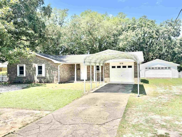 5737 Chumuckla Hwy, Pace, FL 32571 - ranch-style house featuring a front yard, a carport, a garage, and brick siding