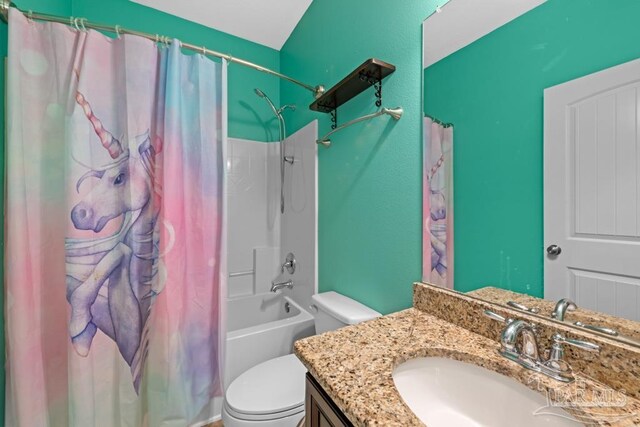 full bathroom with toilet, shower / tub combo with curtain, and vanity