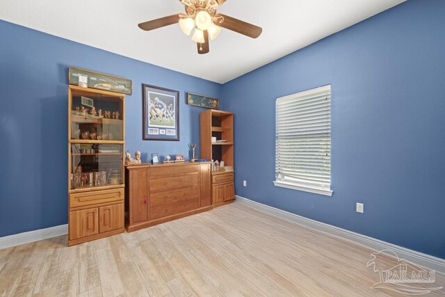 interior space with ceiling fan and light hardwood / wood-style flooring