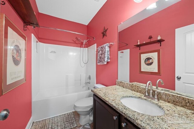 full bathroom featuring vanity, tile patterned flooring, toilet, and shower / bathtub combination