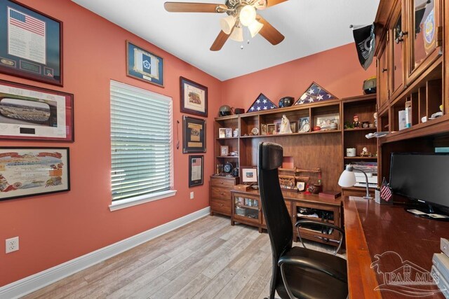 office featuring a wealth of natural light, vaulted ceiling, light wood-type flooring, and ceiling fan