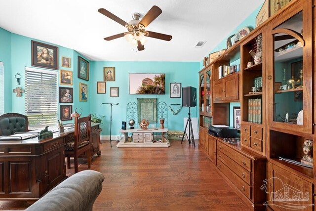 office space featuring dark wood-type flooring and ceiling fan