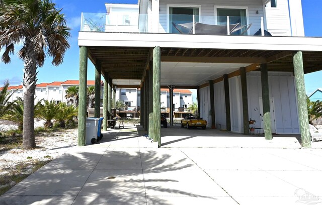 view of patio / terrace featuring a carport