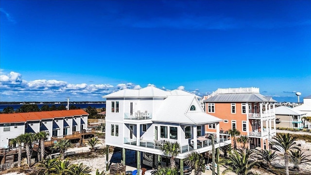 rear view of house with a balcony