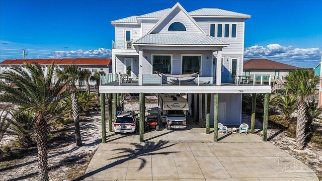 rear view of house with a balcony